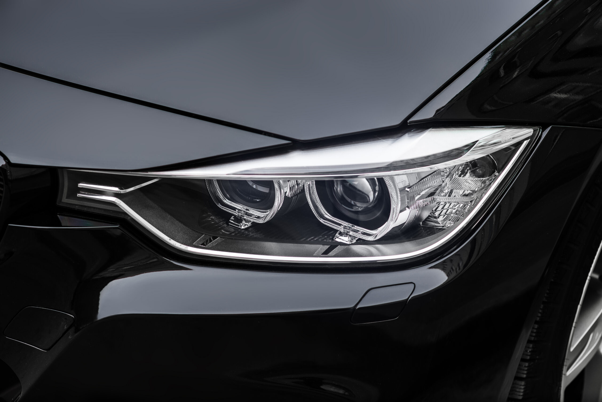 close up photo of car headlights 2026 03 10 02 11 25 utc