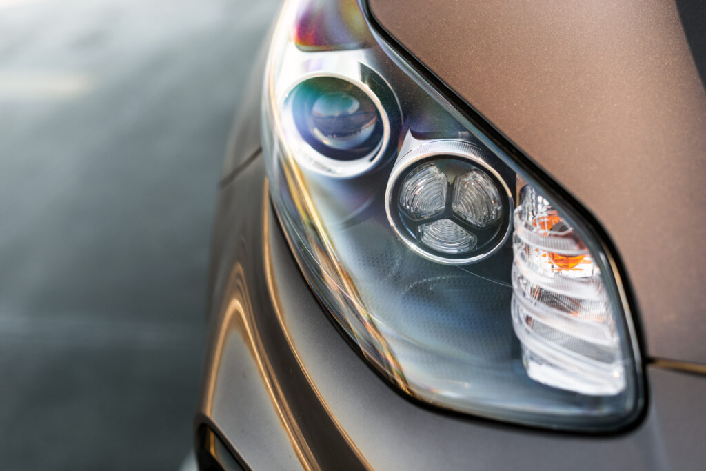beautiful car headlights close up photo 2026 03 10 01 58 53 utc