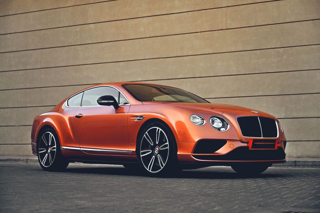 Bentley Continental GT in copper orange, side profile